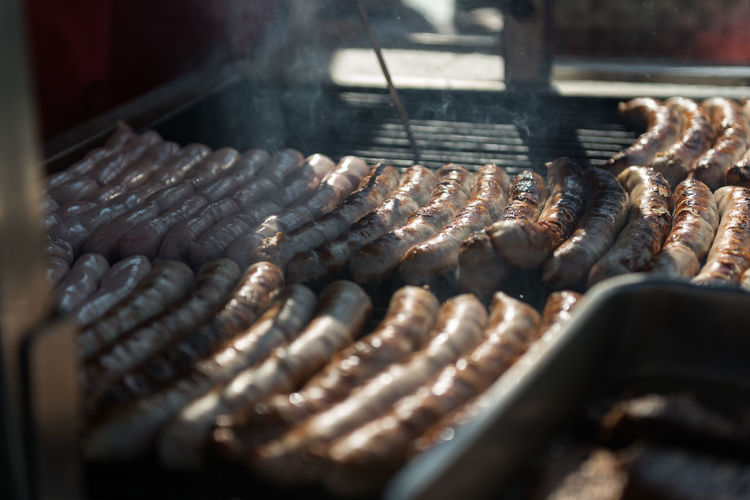 Close-up of sausage on barbecue grill