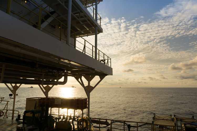 Sunrise seascape viewed from a construction work barge at offshore oil field