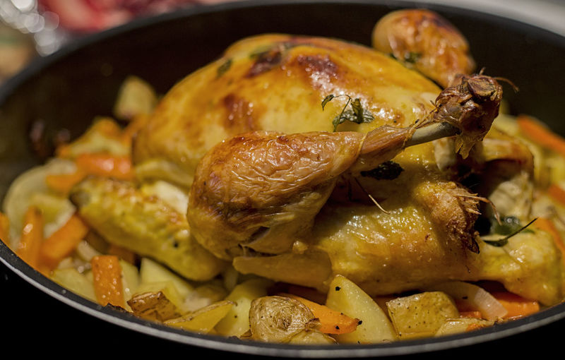 Close-up of roasted chicken in container