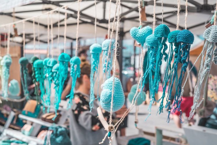 Close-up of woolen jellyfish hanging in store for sale