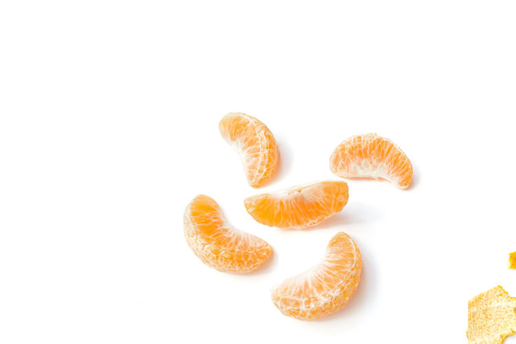 High angle view of oranges over white background