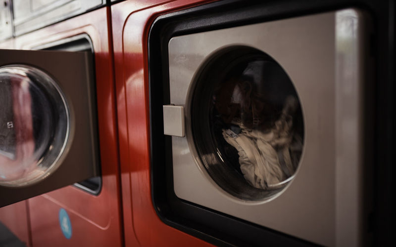 View of washing machine in a laundromat