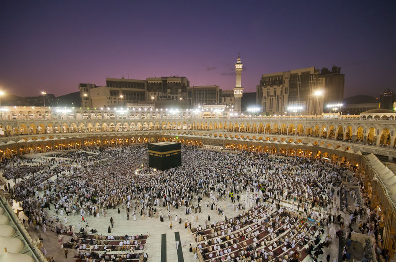 High angle view of people at mecca at night