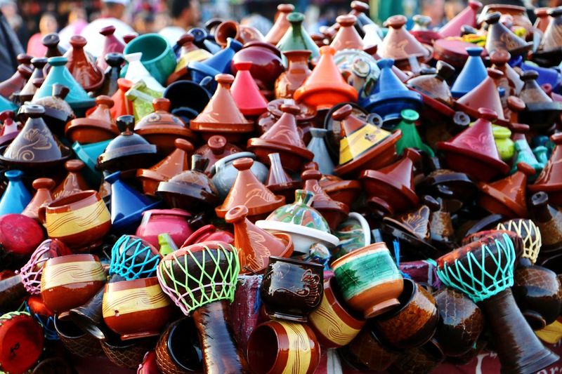 High angle view of multi colored tajine for sale in market