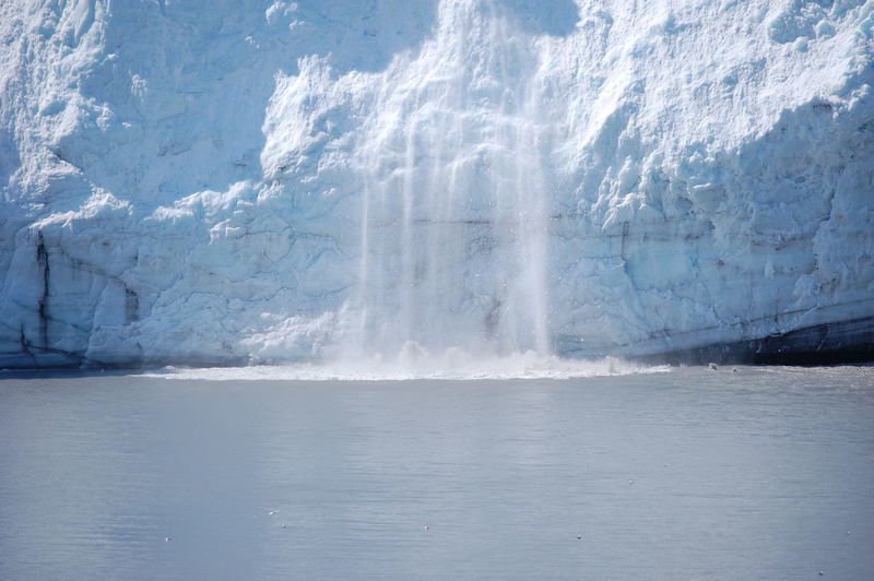 Scenic view of braking ice in water