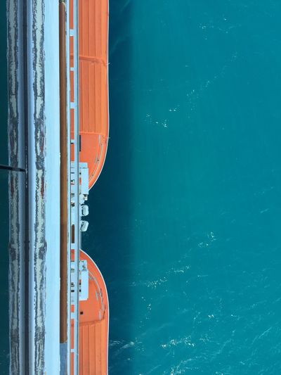 Close-up of boat moored on sea