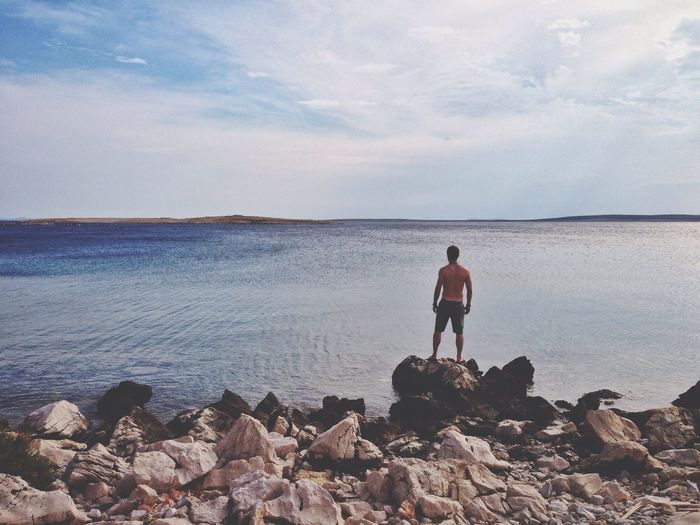 Man standing on rock