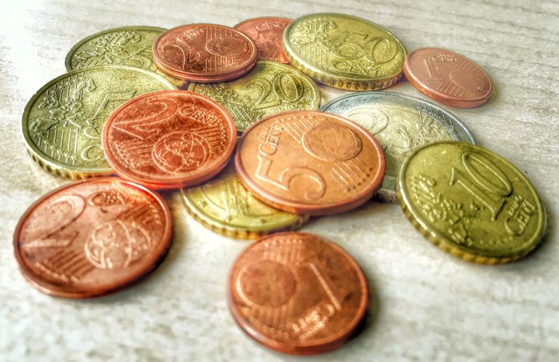 Close-up of euro coins on table