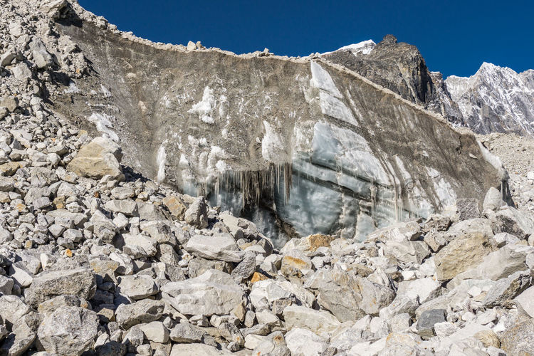 Low angle view of rocks against sky