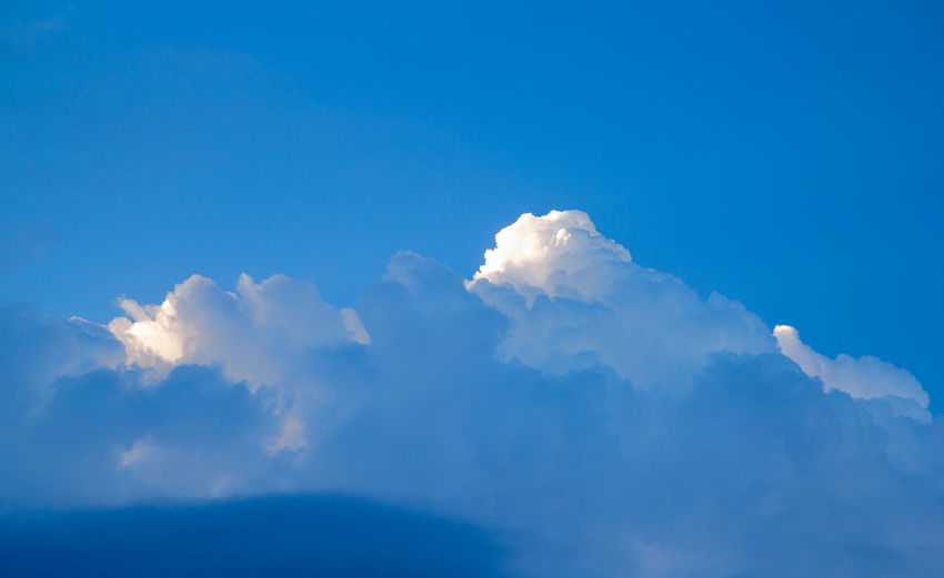 Low angle view of clouds in blue sky