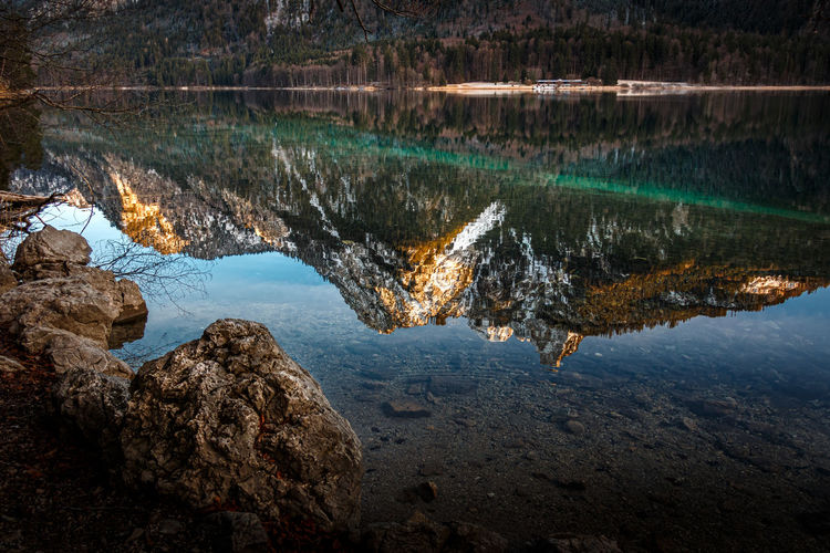 Reflection of snow covered mountains in lake