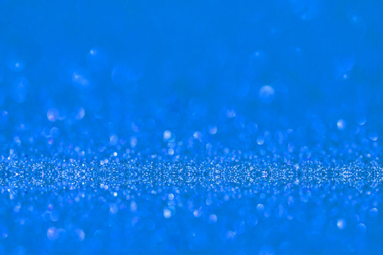 Full frame shot of blue water drops