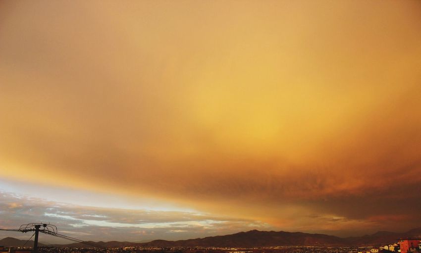Scenic view of landscape against sky during sunset