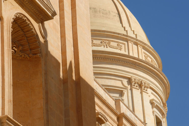 Low angle view of historical building against sky