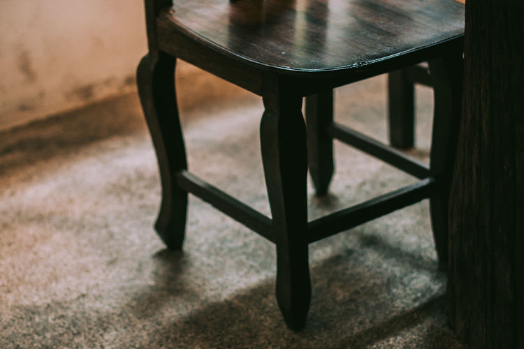 High angle view of empty chair at home
