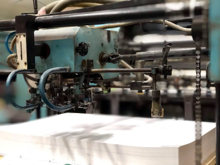 Close-up of machinery in printing press