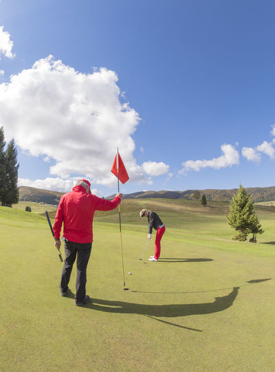 Senior couple on golf course