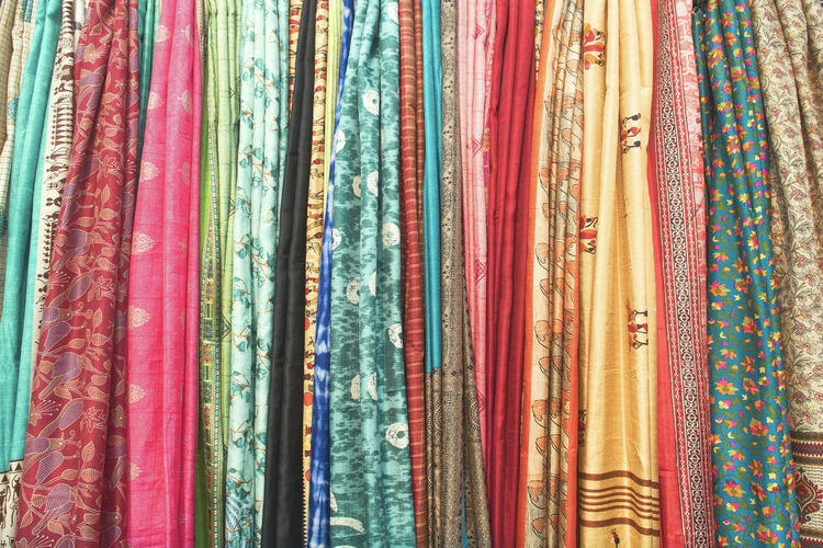 Indian sarees, with vibrant multicolor ethnic design and motifs. at saras mela, kolkata.
