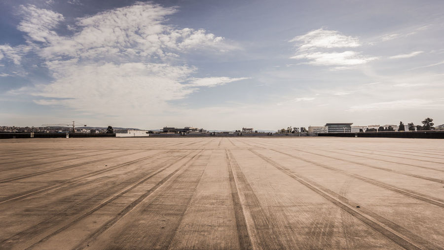 View of airport runway against sky