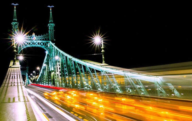 Blurred motion of car on road at night