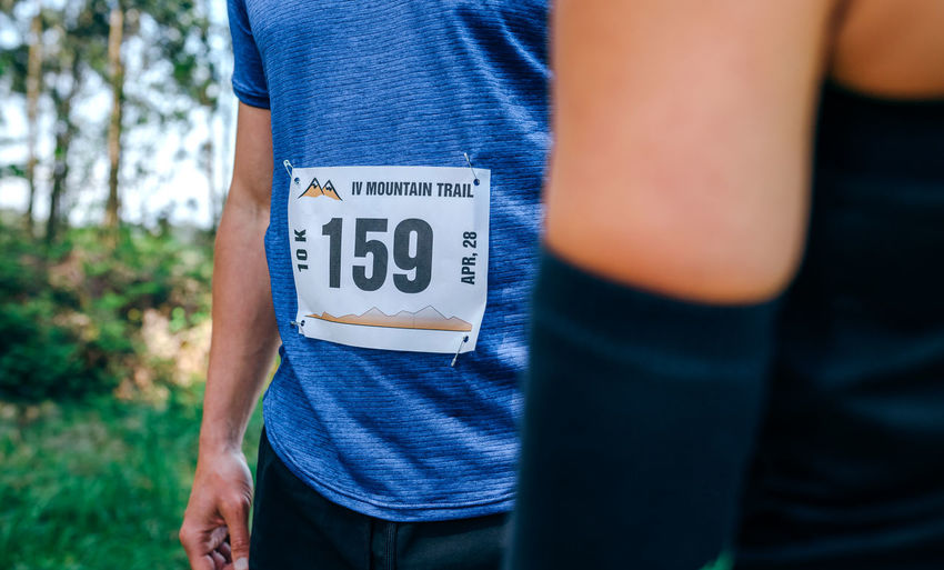 Midsection athletes with label on clothes