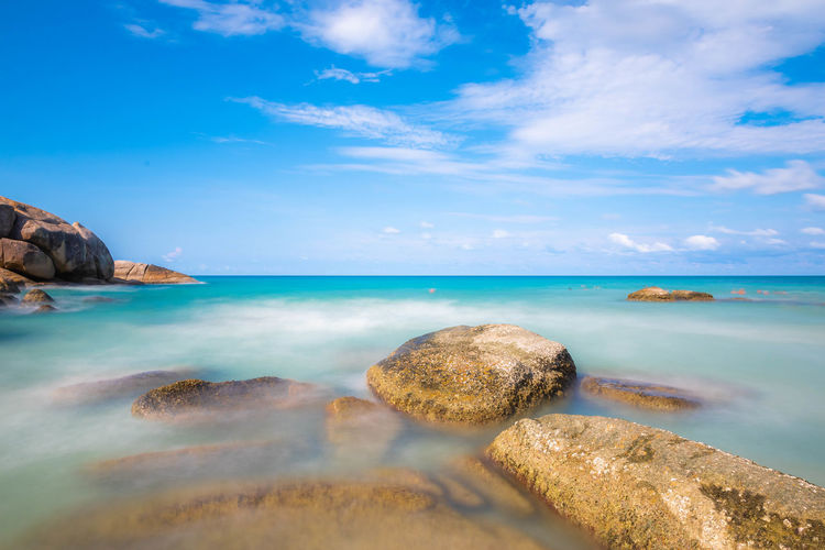 Long exposure shot of sea and the rocks on the beach in koh samui.