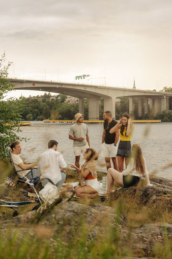 Group of friends sitting at beach