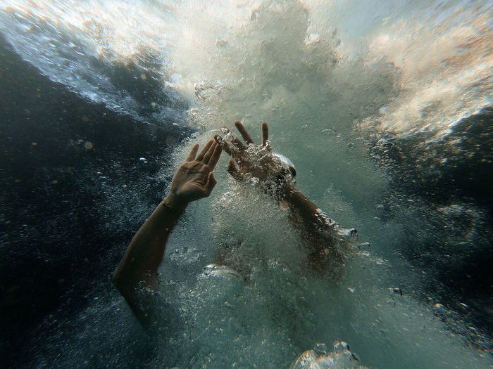 Person swimming in sea