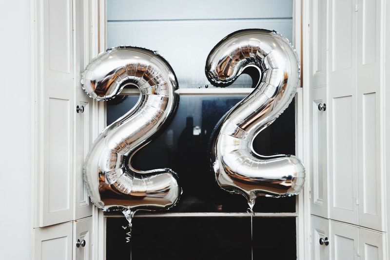 Close-up of number helium balloons at home