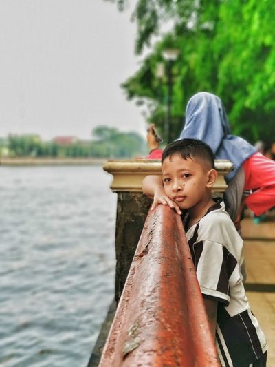 Portrait of boy on water