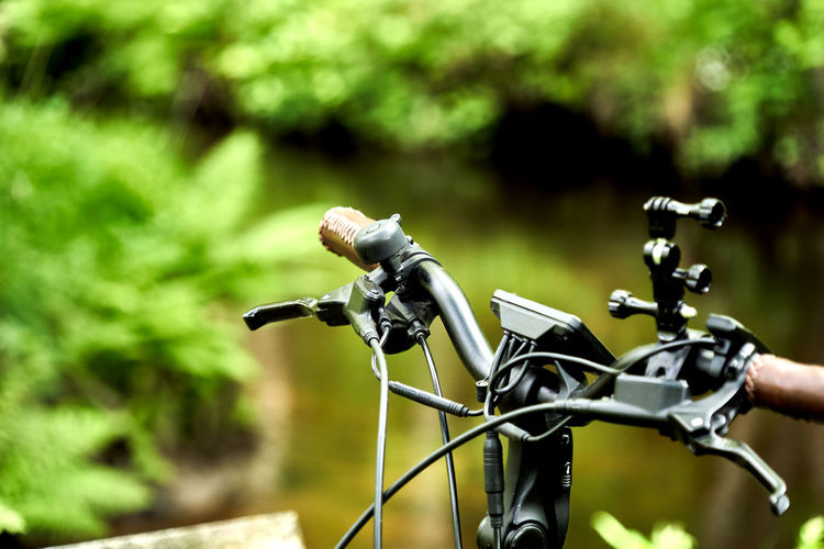 Close-up of bicycle on field