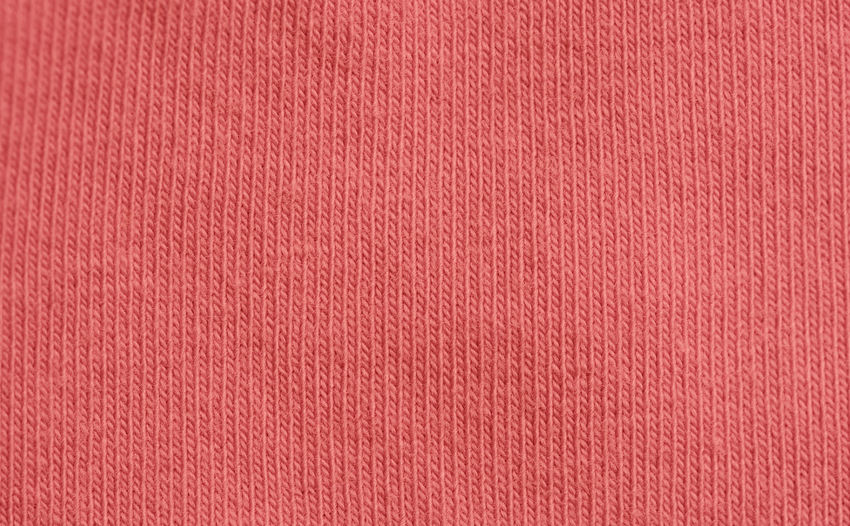 Full frame shot of red woolen fabric