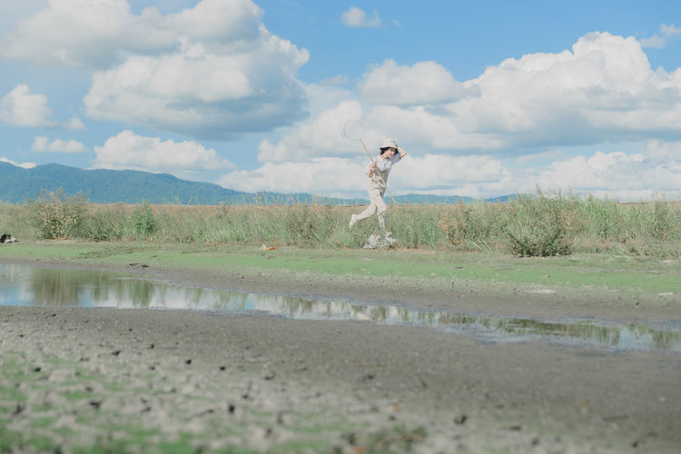 Dog standing in a lake
