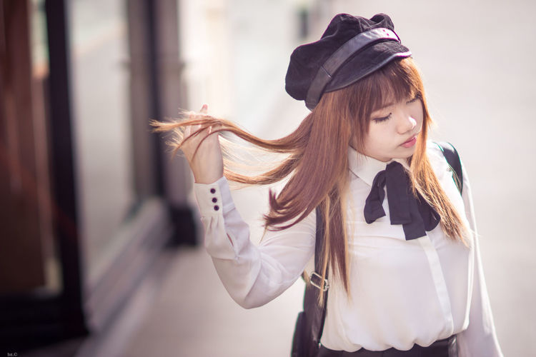 Young woman wearing hat