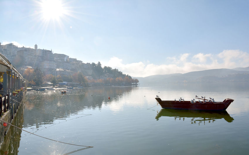 An autumn sunny morning on the lake orestida in kastoria, greece