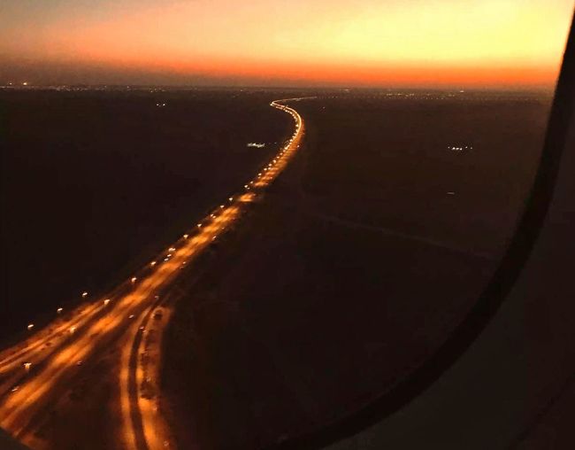 Aerial view of illuminated road at night