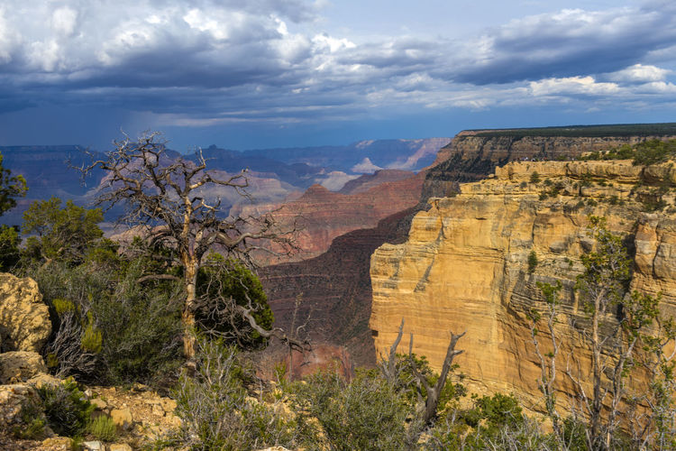 Scenic view of rocky mountains against sky
