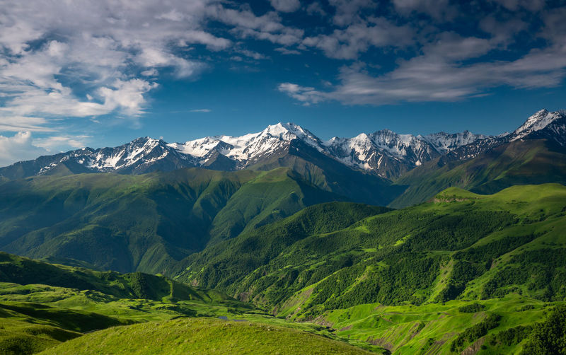 Scenic view of snowcapped mountains against sky. mountains of chechnya