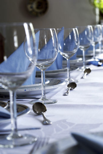 Row of wineglasses on table at restaurant