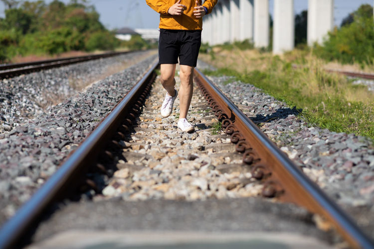 Low section of person on railroad track