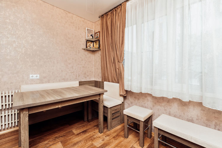 Wooden table and chairs in the kitchen