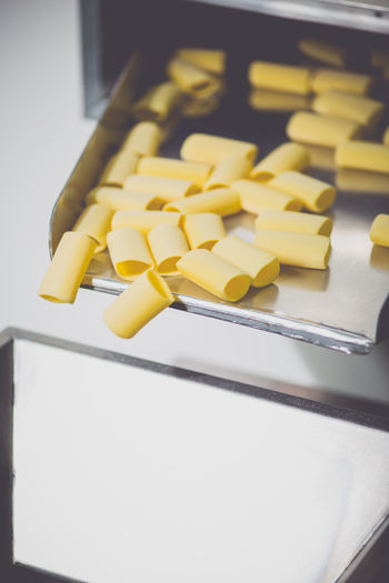 Close-up of pasta in machinery