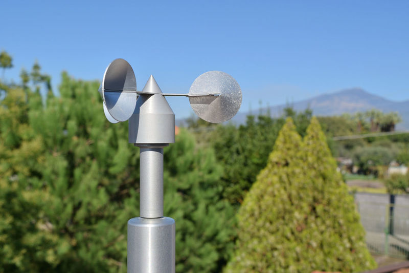 Telephone pole against clear sky