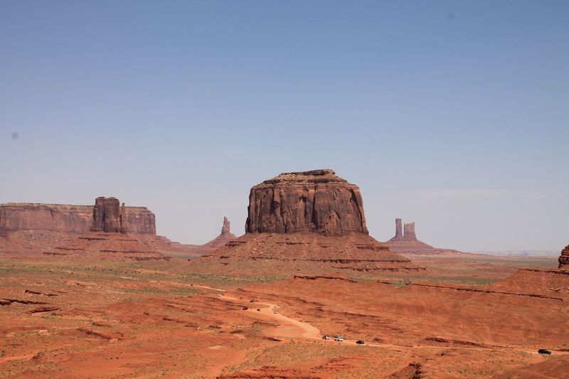 View of rock formations at monument valley tribal park against clear sky