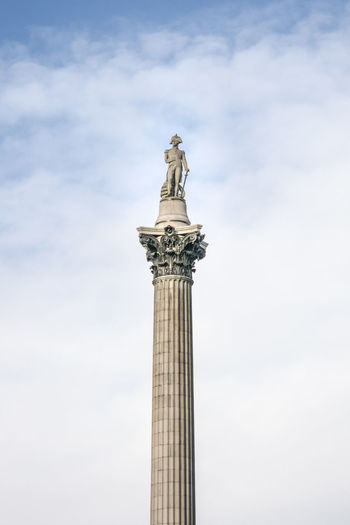 Nelsons column, located in trafalgar square, london, uk