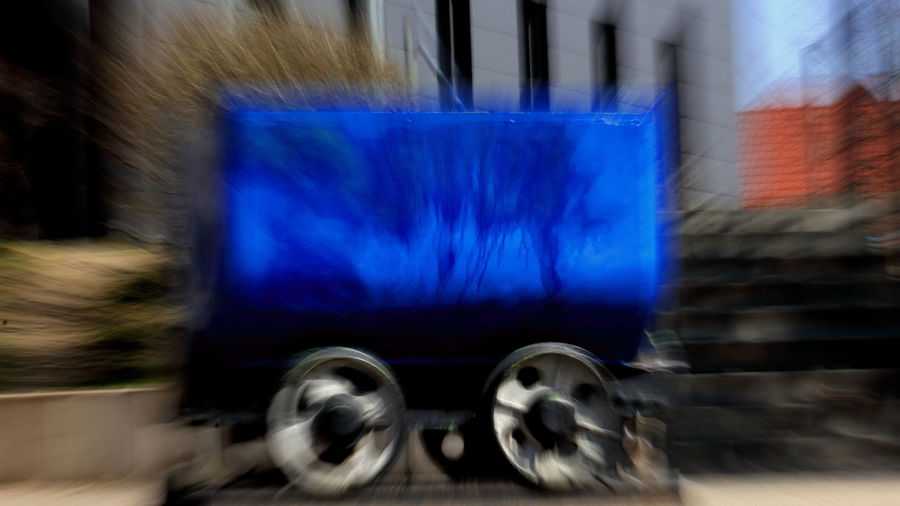 Blurred motion of car on street in city