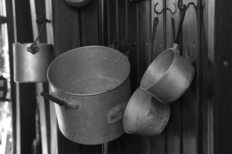 Close-up of clothes hanging on metal