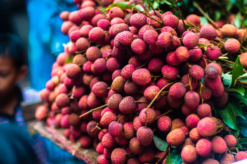 Close-up of lychees for sale at market