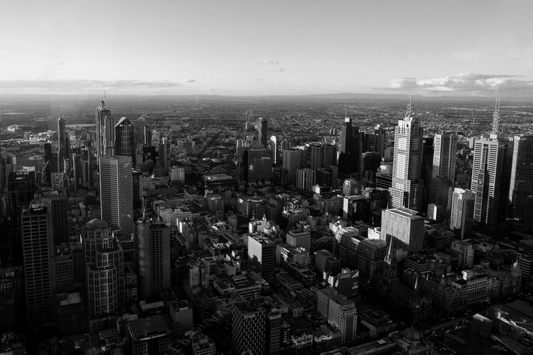 High angle view of modern buildings in city against sky, melbourne australia