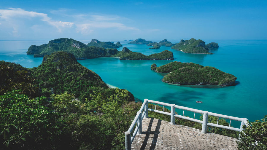 High angle view of tropical islands in emerald water and viewpoint deck. mu koh ang thong. thailand.